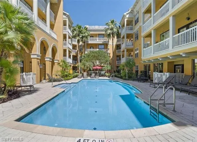 View of swimming pool with a patio