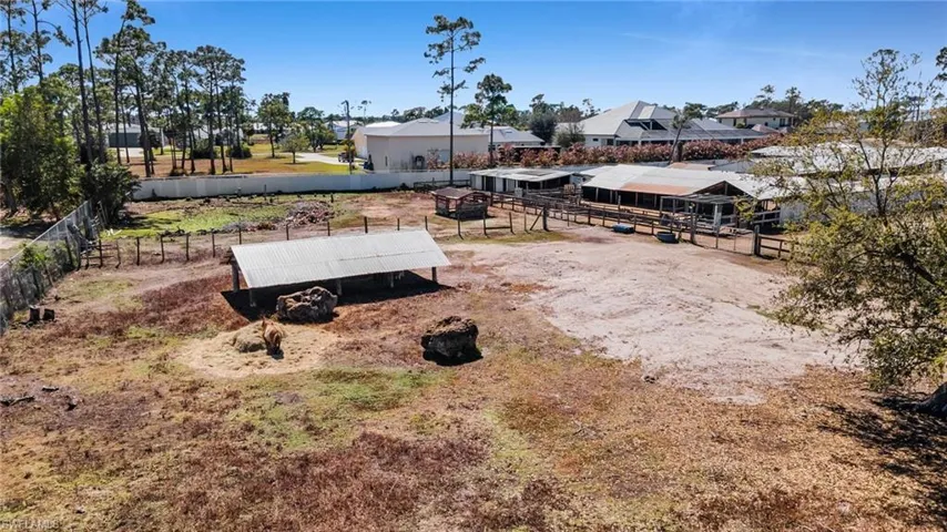 View of yard with an outbuilding and an exterior structure