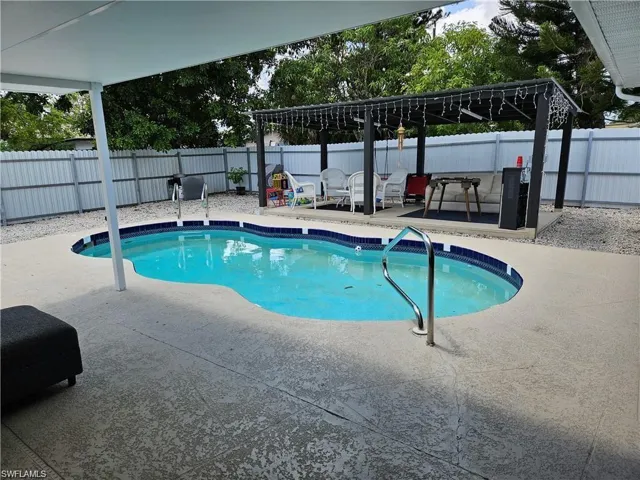 View of pool featuring a patio area
