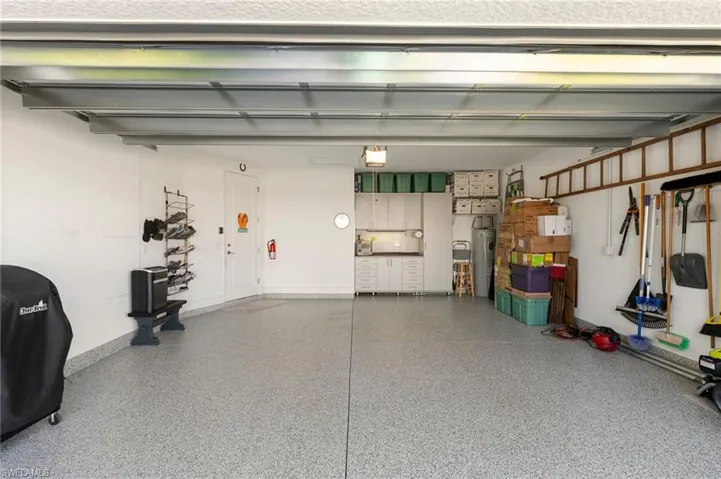 Garage featuring a garage door opener