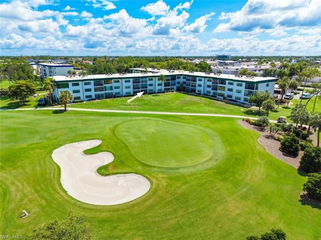 View of the condo building and the view of hole #7 green