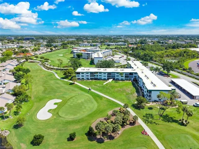 Condominium building situated on a golf course with green fairways