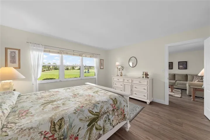 Primary bedroom with a view of the golf course