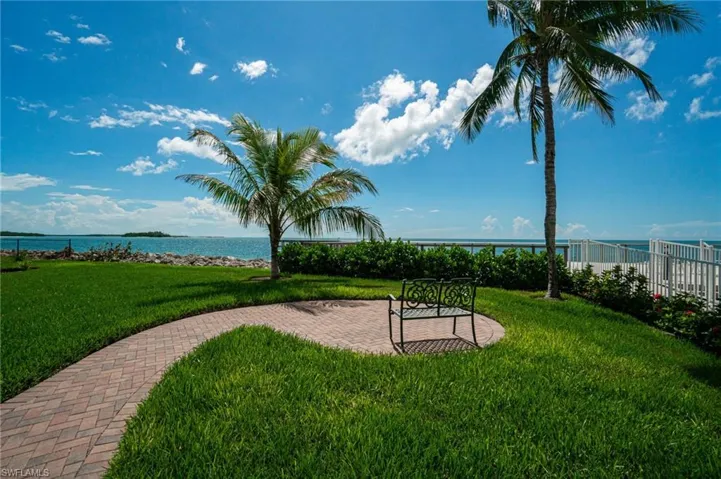The Community grassy GULF FRONT walkway leads out to the spacious boardwalk and fishing pier.