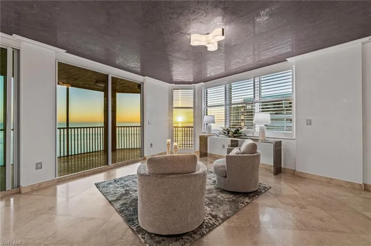 Take in breathless sunsets from your own private sitting area surrounded on two sides by enormous glass openings.