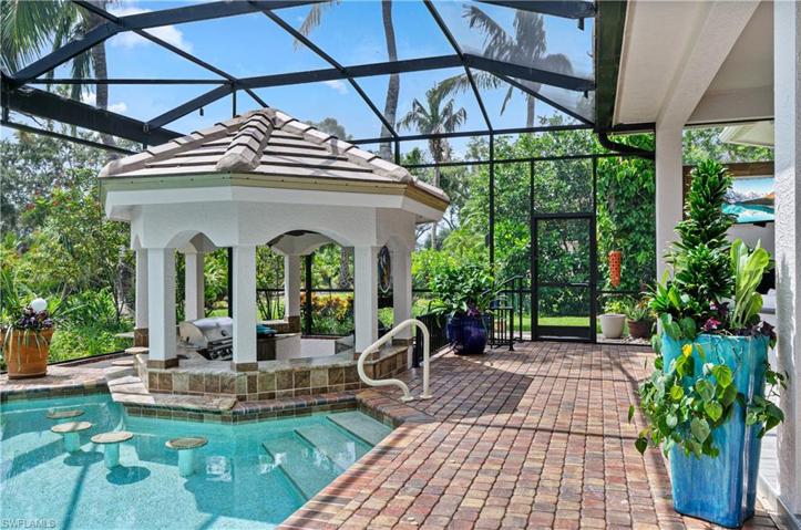 Swim up Gazebo bar with stools in water