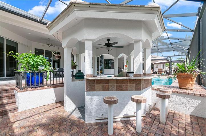 Outside stools of gazebo Summer Kitchen