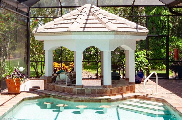 Gazebo with stools in water