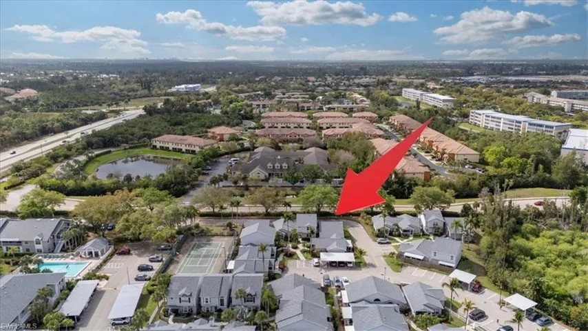 Aerial view of residential area with a large body of water