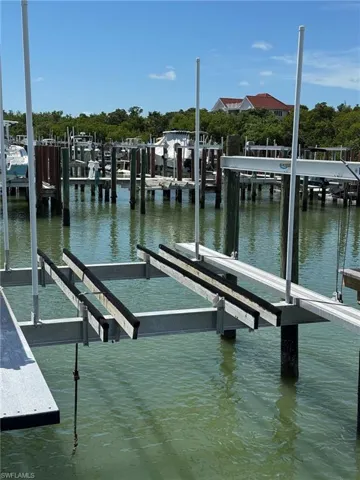 Dock featuring a water view and boat lift