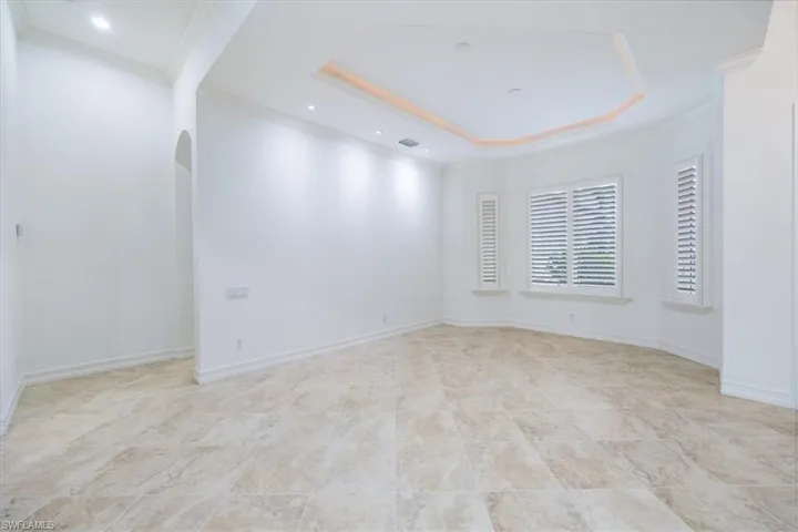 Dining room off the great room (not shown) across the front door and the den.