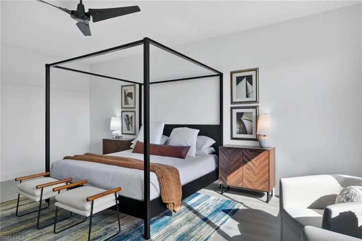 Bedroom featuring a ceiling fan and wood finished floors