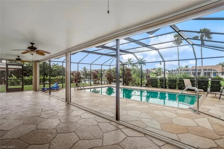 Extra spacious lanai with storm shutter enclosure.