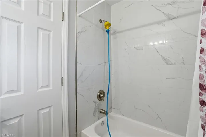 Full bathroom with shower / bathtub