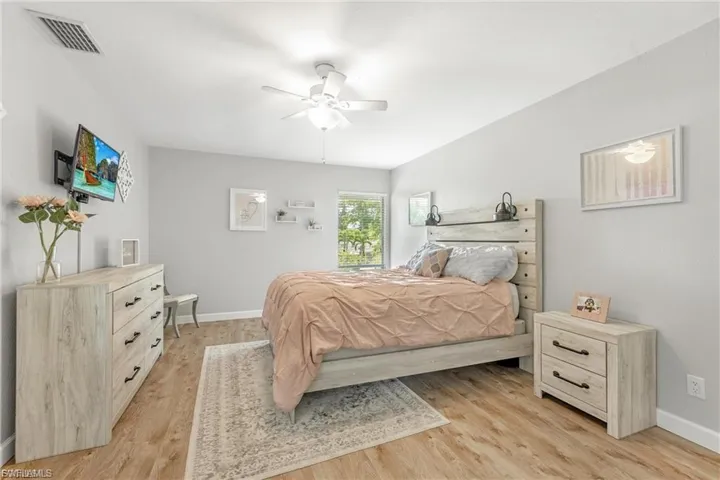 Bedroom featuring ceiling fan and light wood-style floors