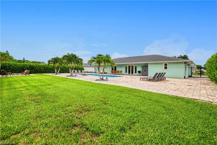 View of yard featuring a patio and a yard & pool
