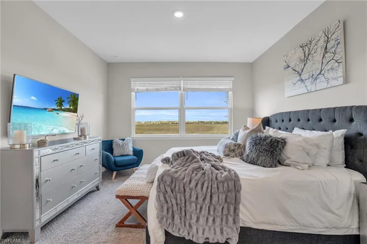 Bedroom featuring carpet flooring and recessed lighting