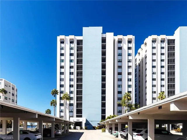Exterior view of Sunset Royale and the owners' covered parking