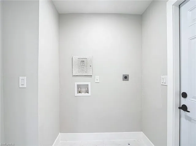 Laundry area with hookup for a washing machine and electric dryer hookup