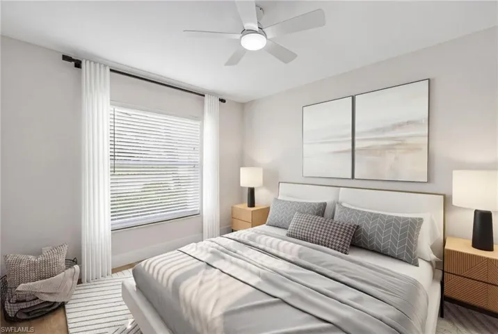 Bedroom with baseboards and ceiling fan
