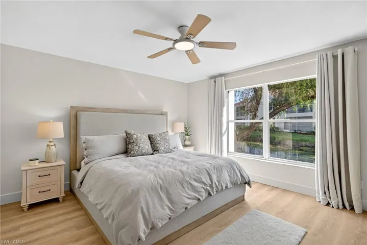 Bedroom featuring light wood-style flooring and ceiling fan