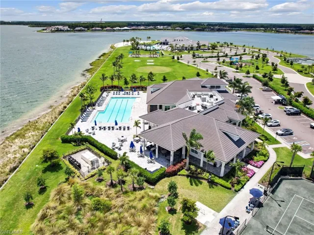 Aerial view of a large body of water and a pool area