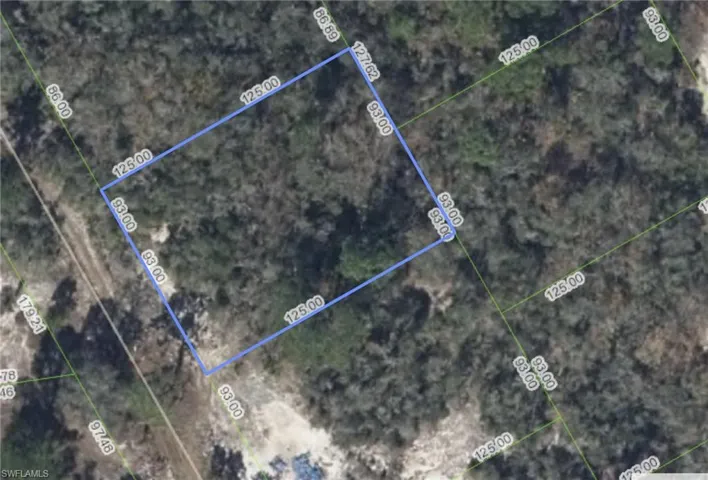 Aerial view of property's location featuring property parcel outlined