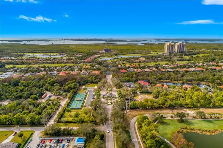 Aerial overview of property's location featuring a large body of water