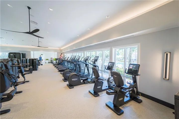 Exercise room with ceiling fan and recessed lighting