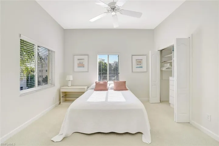 Bedroom featuring carpet flooring and ceiling fan
