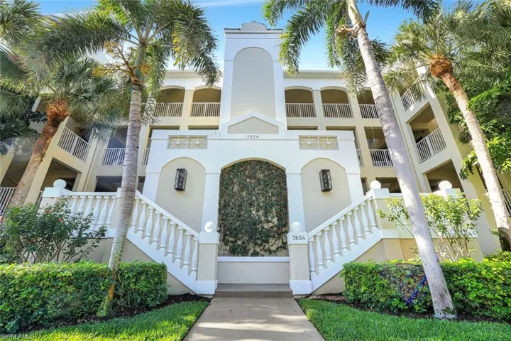 View of apartment building / complex with stairs