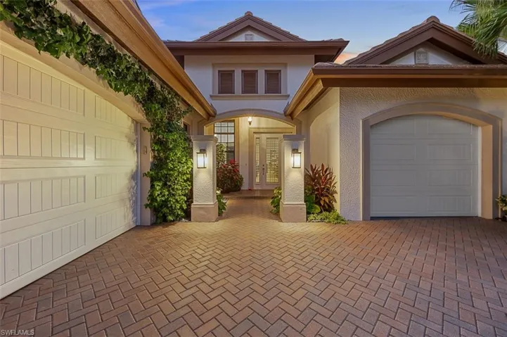 View of front of house with a garage