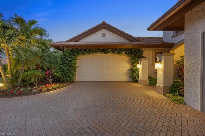 View of front facade featuring a garage