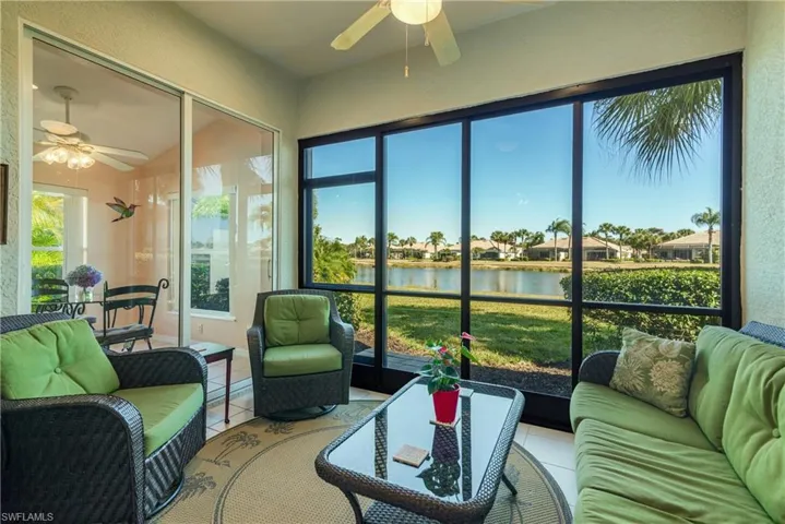 Sunroom / solarium featuring an outdoor lounge area and ceiling fan