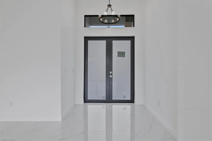 View of exterior entry with french doors