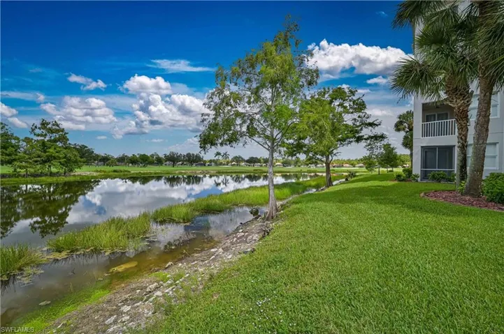 From the covered balcony, the owner(s) have a unique vantage point to the beauty of the lake and golf course.