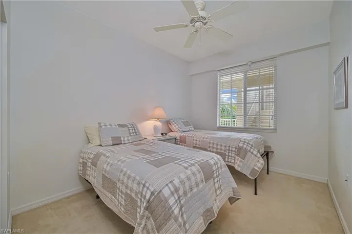 The second bedroom has twin beds, but can accommodate a queen bed and complementary furniture.