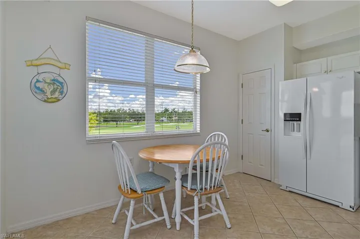 Take note of the pantry to the left of refrigerator, which add even more storage in the kitchen.