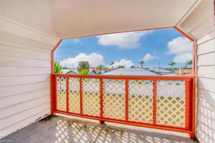 View of balcony from upstairs bedroom.