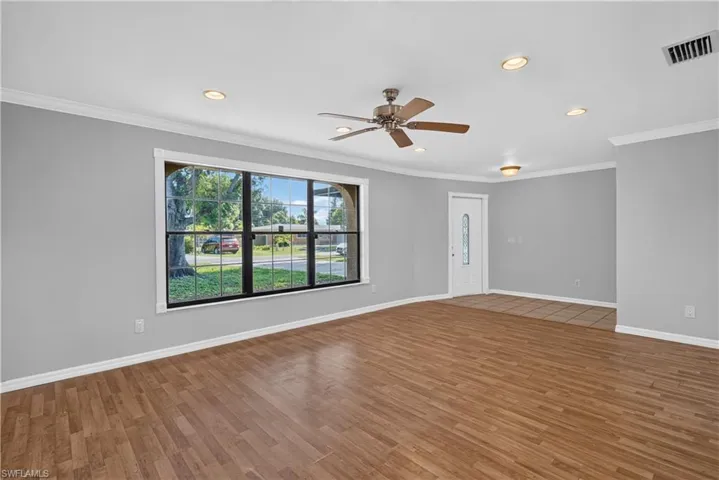 Living room and front entry door.