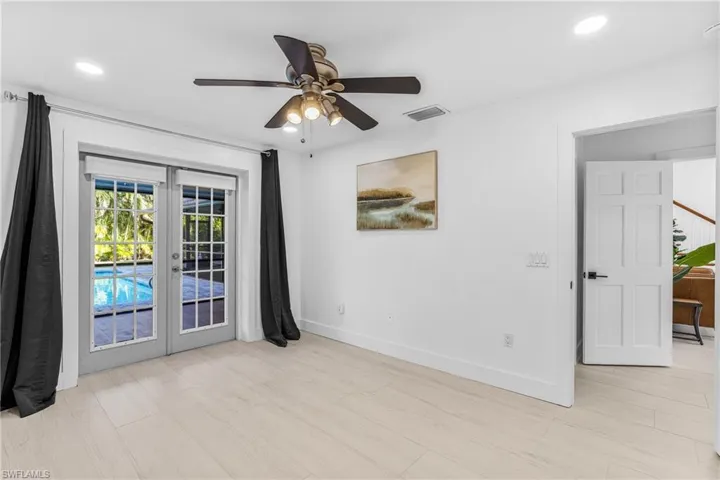Property entrance with a patio