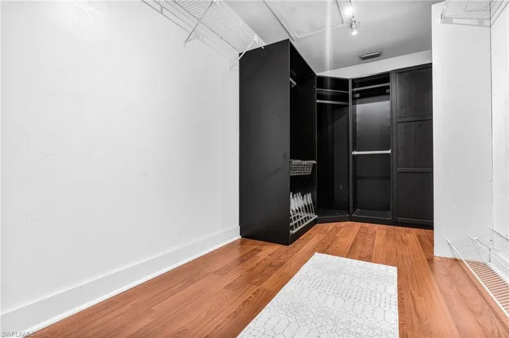Empty room with recessed lighting, wood finished floors, and ceiling fan