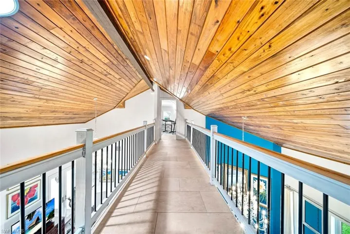 Upstairs catwalk with office at each end