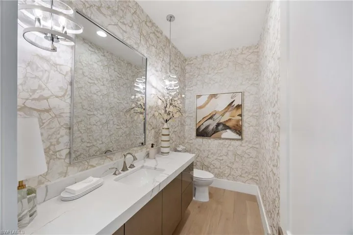 Bathroom featuring light wood finished floors and vanity