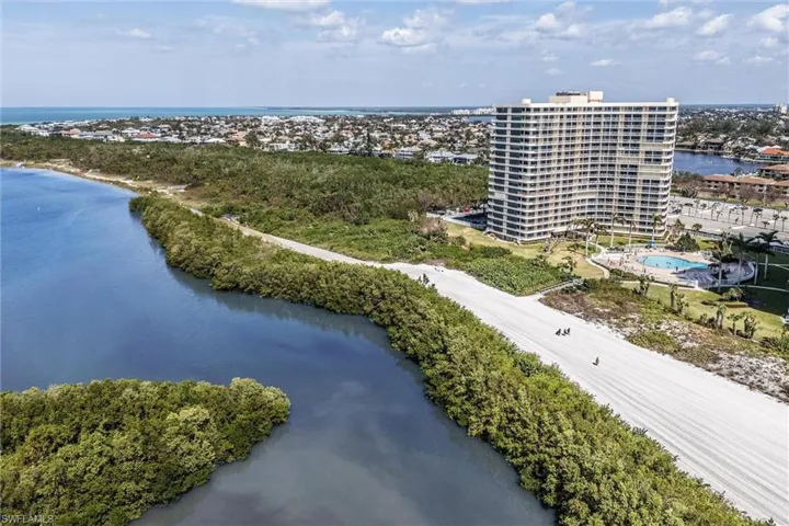 Bird's eye view of a large body of water and a pool area