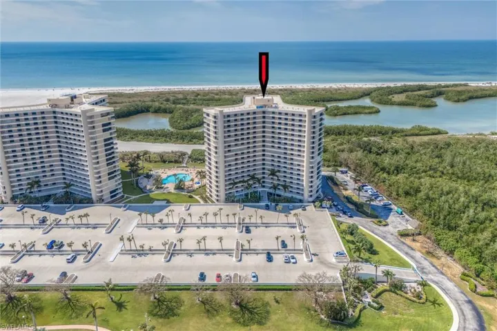 Bird's eye view of apartment complex / building and a large body of water