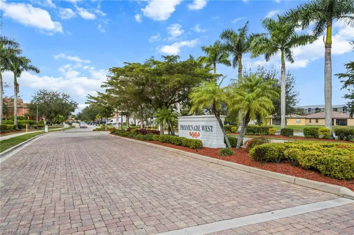 View of decorative street featuring curbs and sidewalks