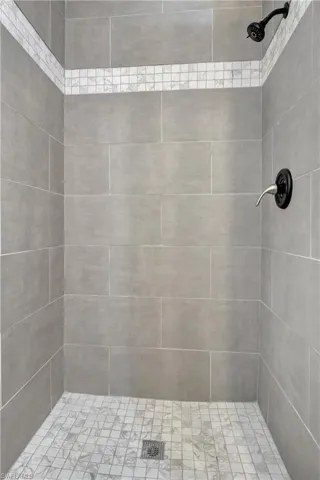 Bathroom with tiled shower