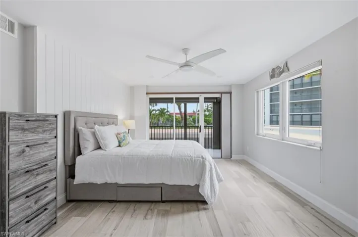 Primary bedroom with marina view