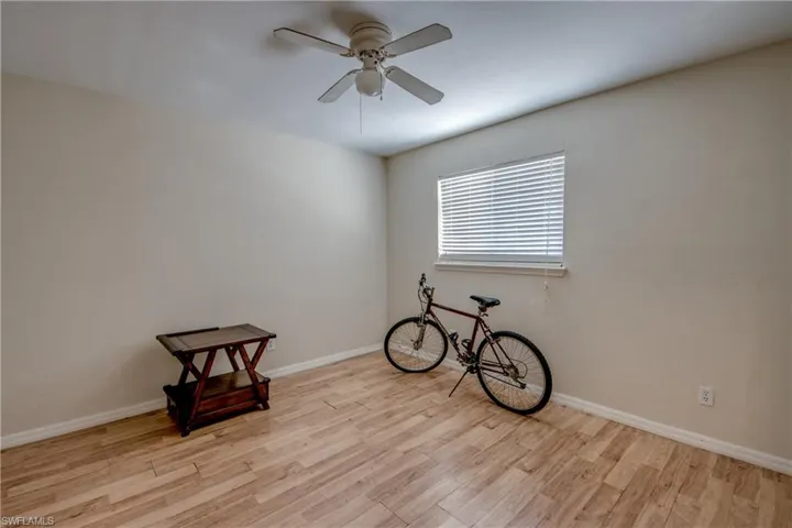 Spare room with light wood-style flooring and ceiling fan